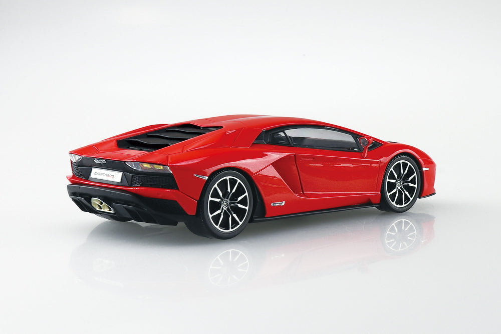 Red lamborghini aventador model car on a white background