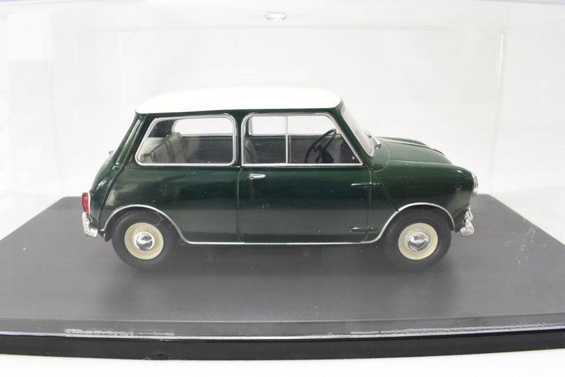 Austin Mini Cooper S 1965 1:24 scale diecast model on stand with display case side