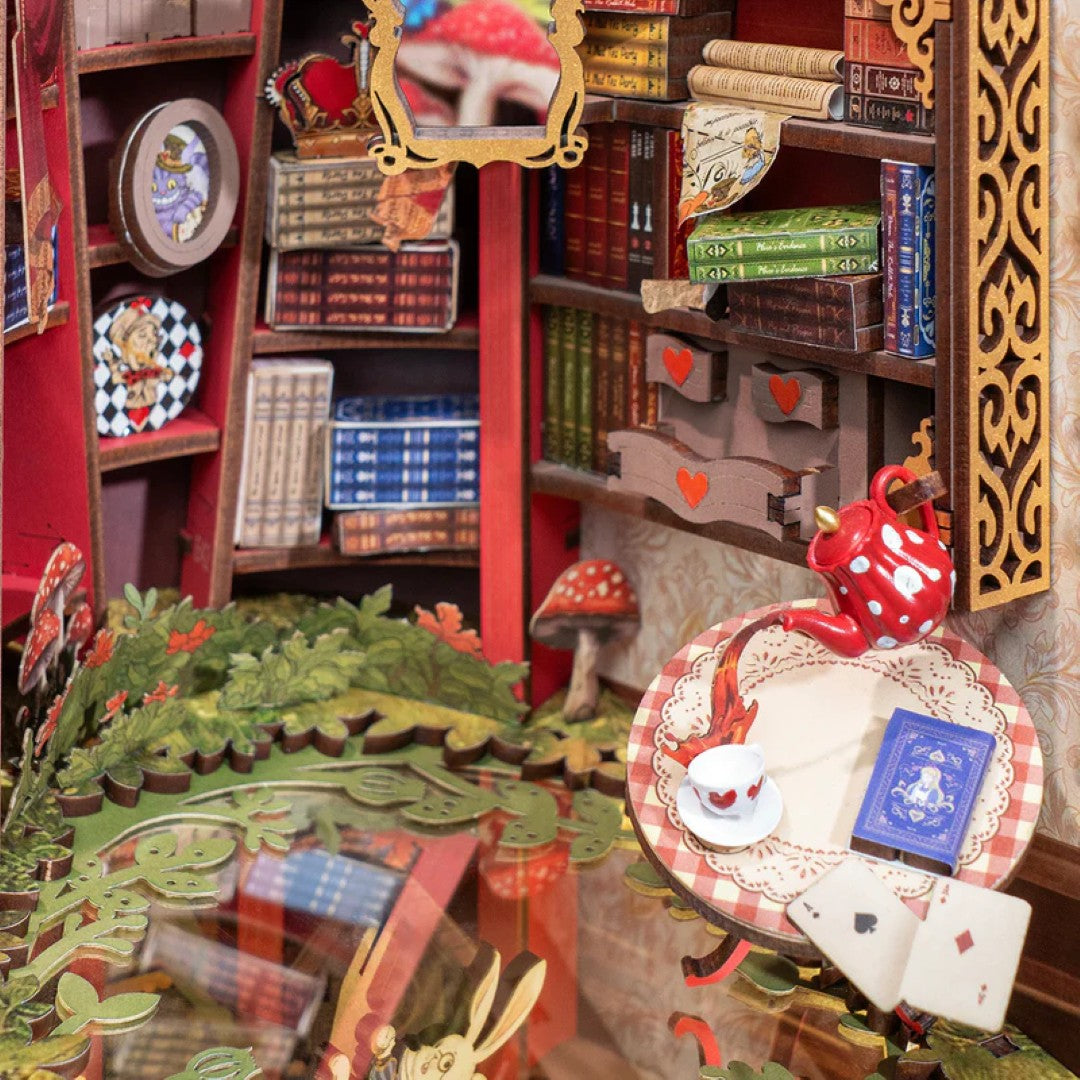 Detailed diorama with books, toys, and decorative items on a shelf.