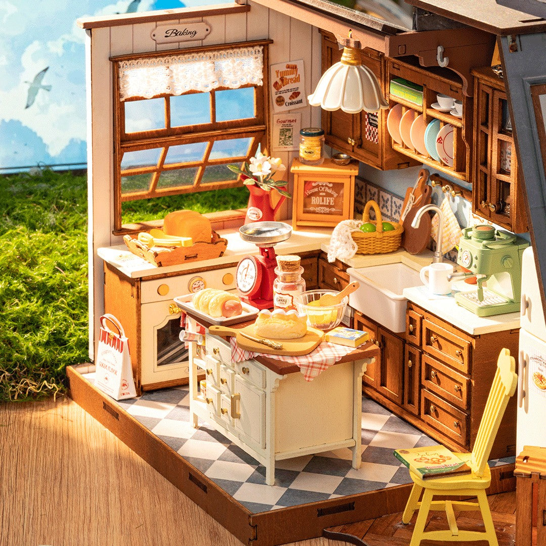 Detailed model of a kitchen with wooden cabinets, appliances, and decor.
