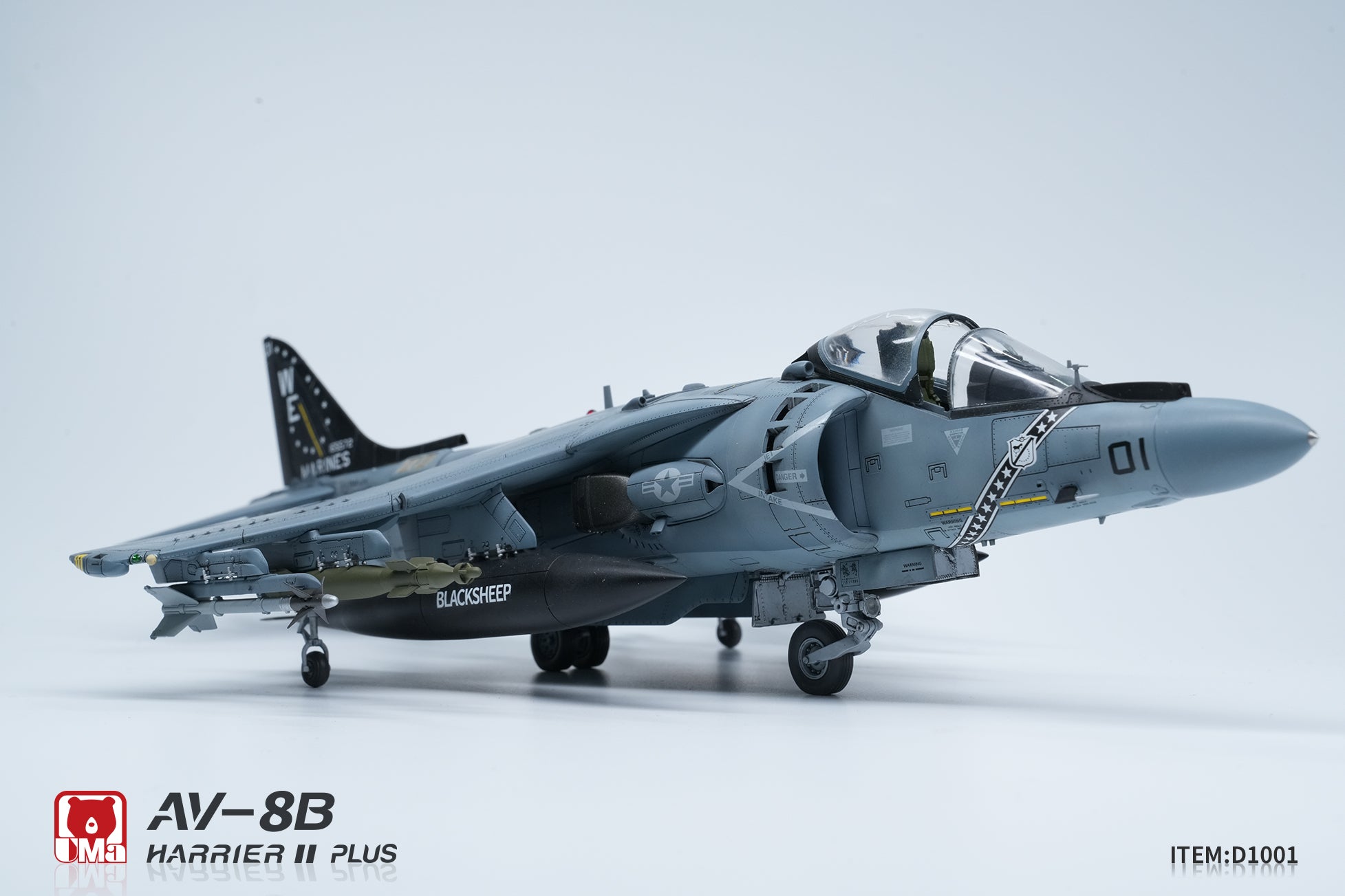 Model of an AV-8B Harrier II Plus on a light gray background