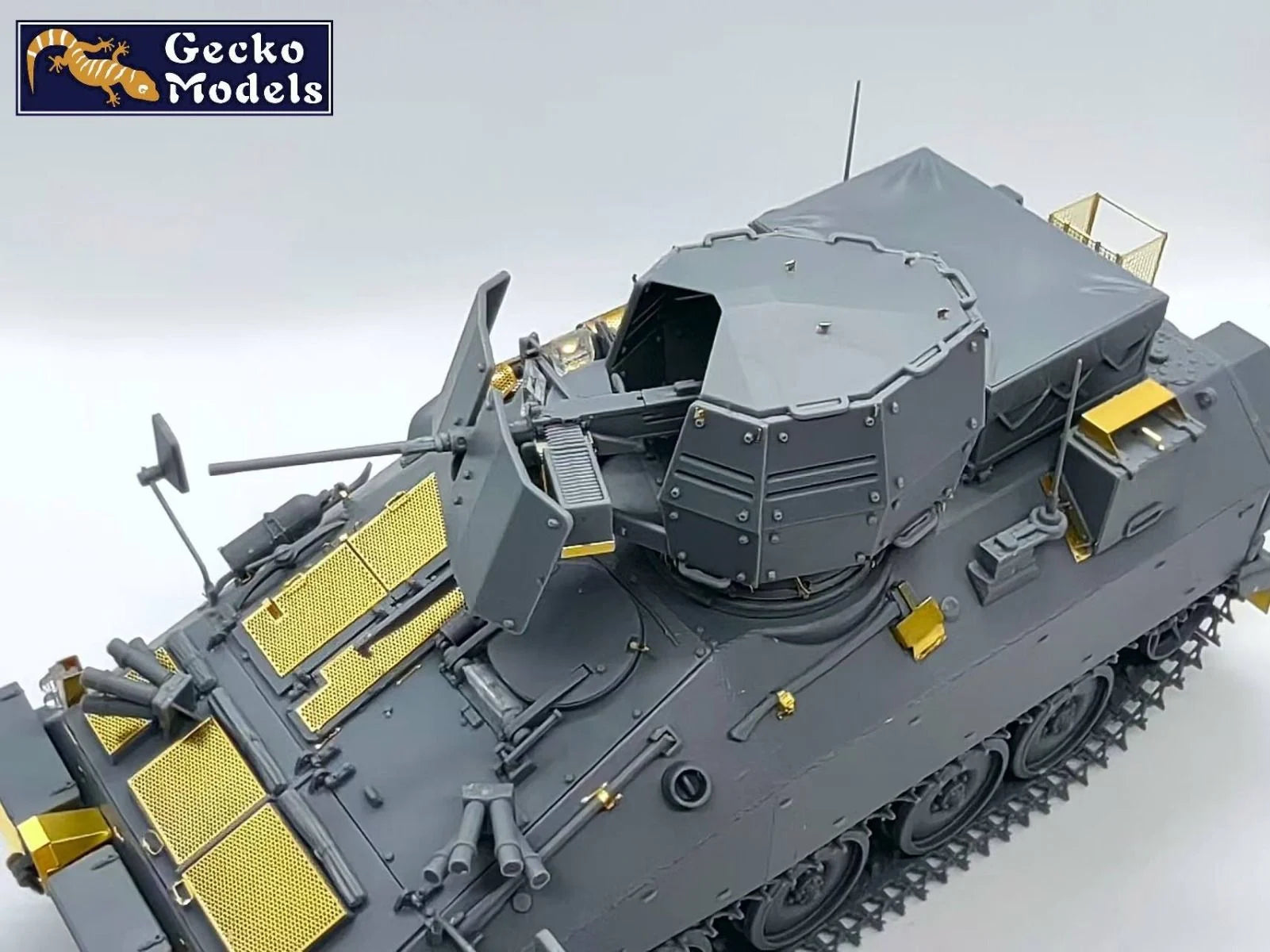 Model tank with detailed armor and weaponry on a white background, branded 'Gecko Models'.
