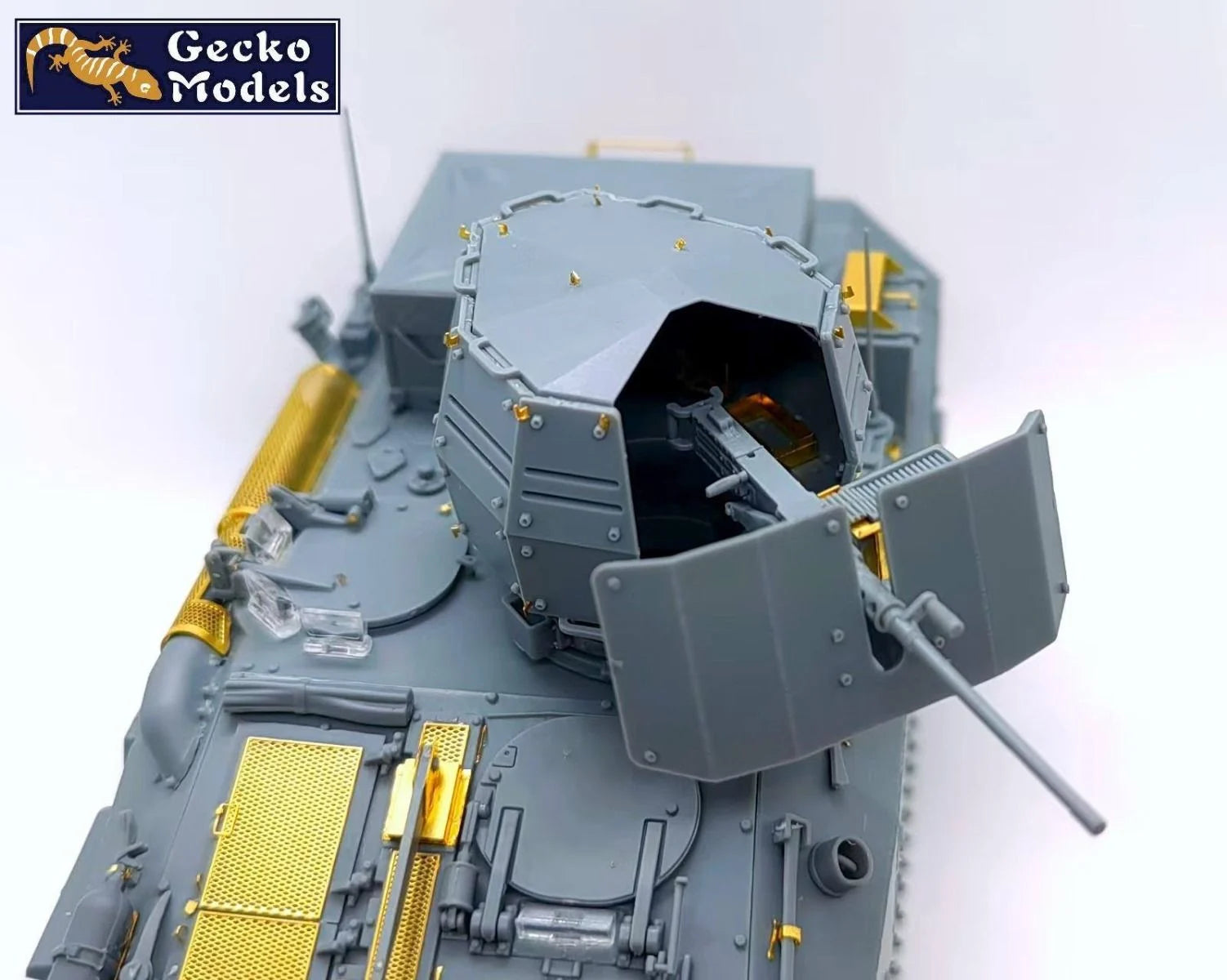 Model of a military vehicle with detailed components on a white background, featuring Gecko Models branding.