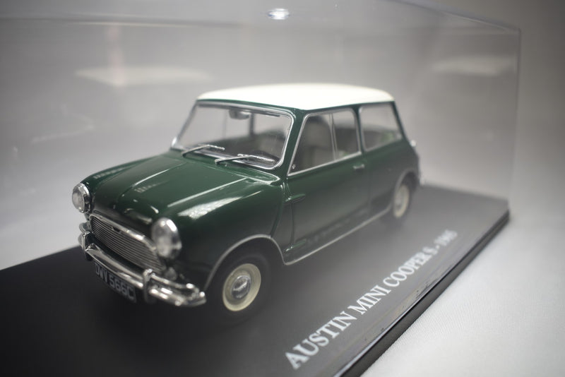 Austin Mini Cooper S 1965 1:24 scale diecast model on stand with display case side view