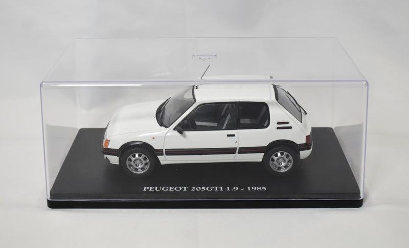 Peugeot 205 GTI 1.9 1985 1:24 scale diecast model on stand with display case
