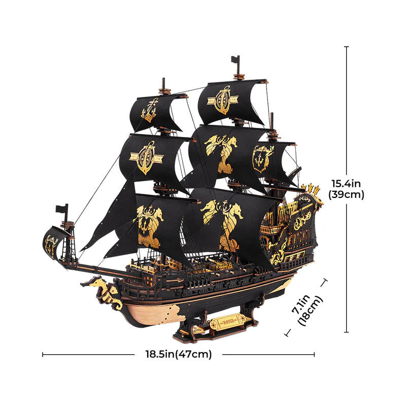 Model ship with black sails and gold details, shown with dimensions on a white background