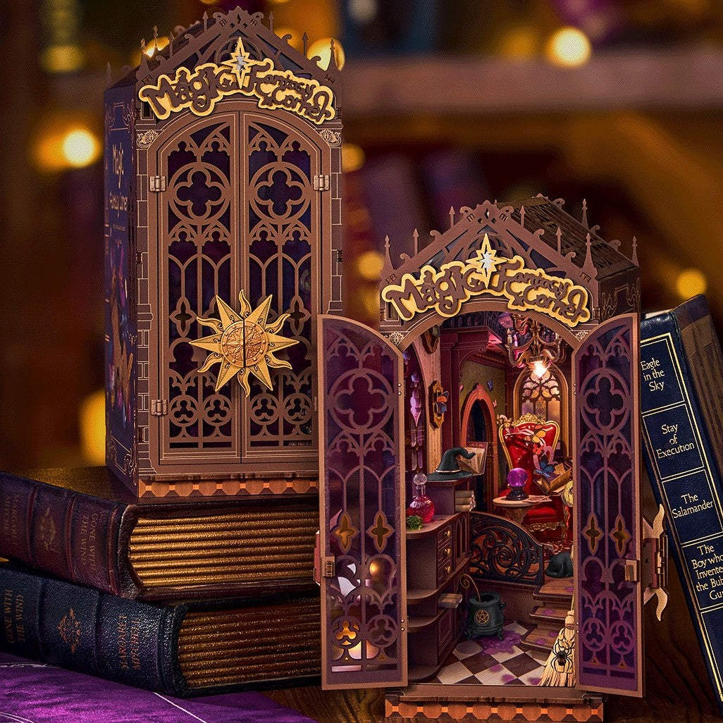 Detailed model of a magical castle with open doors, books around, and a warm glow.