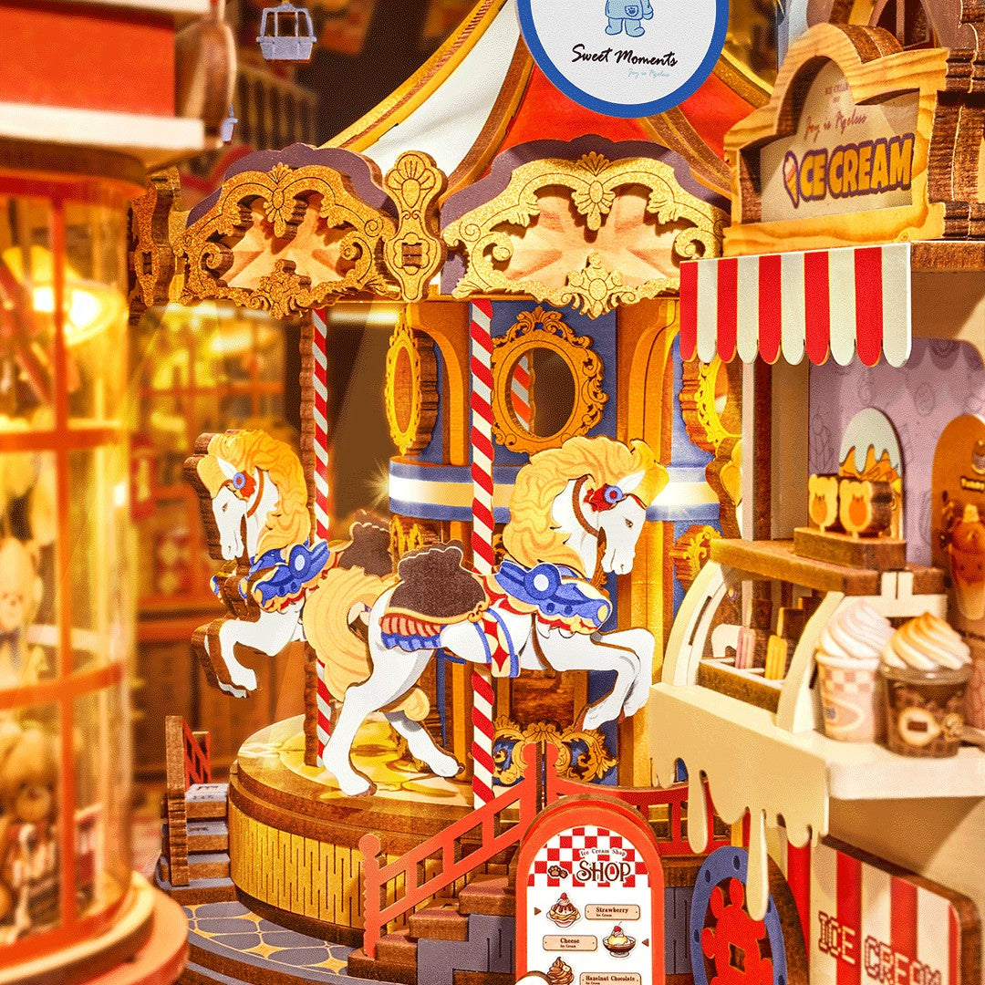 Wooden carousel toy with horses and a ice cream stand in a festive setting
