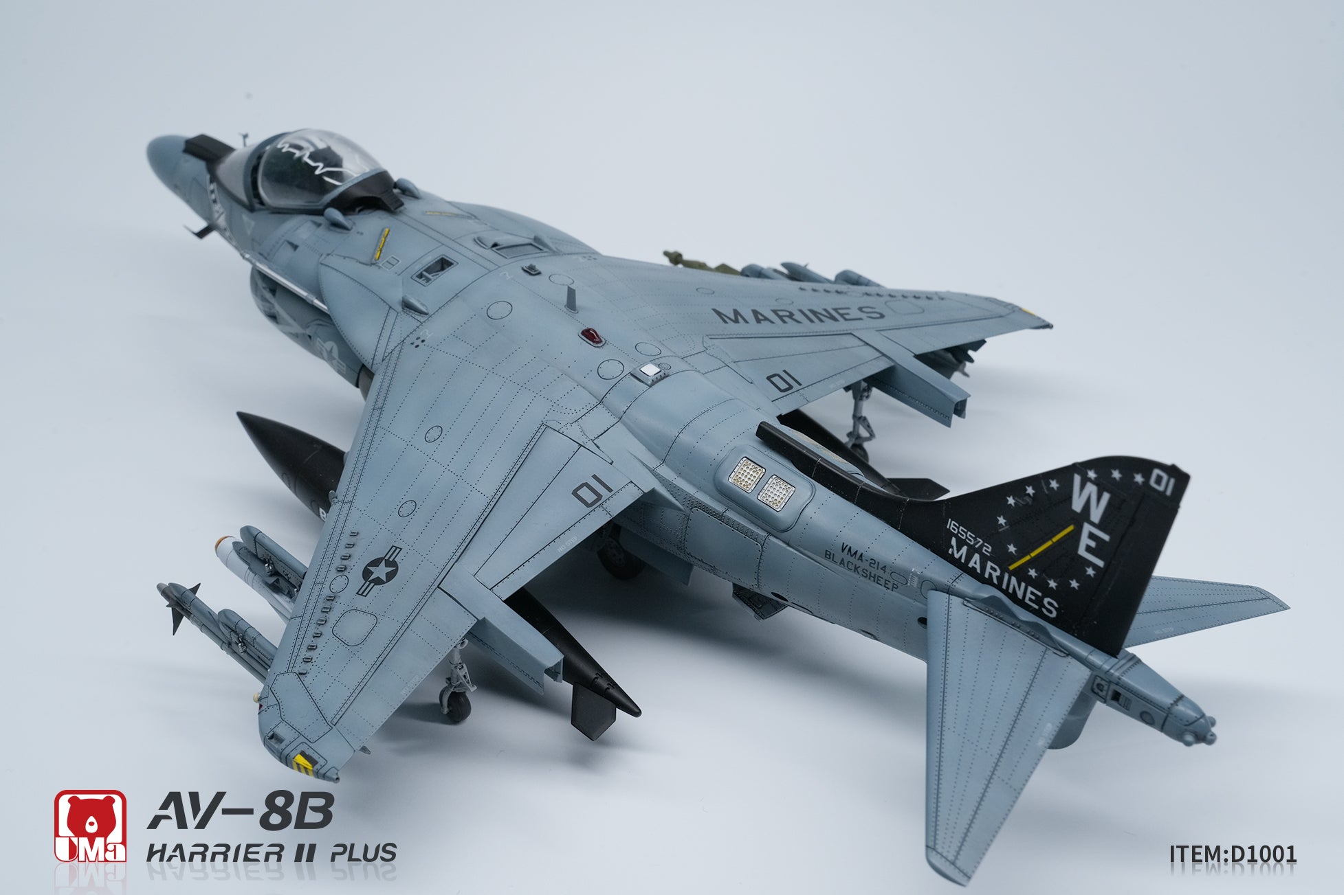Model of a military aircraft with 'Marines' and 'AV-8B Harrier II Plus' branding on a light gray background.